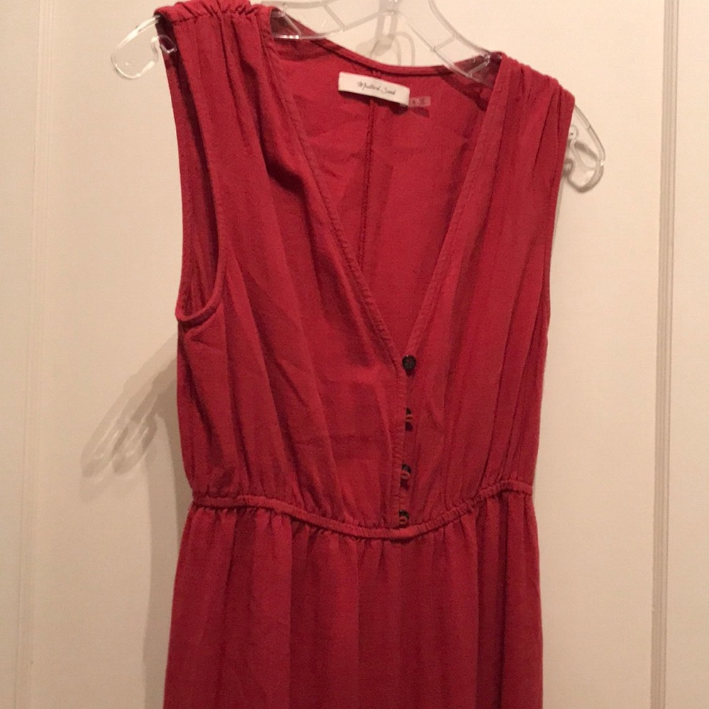 Jumpsuit gathered at ankle.
